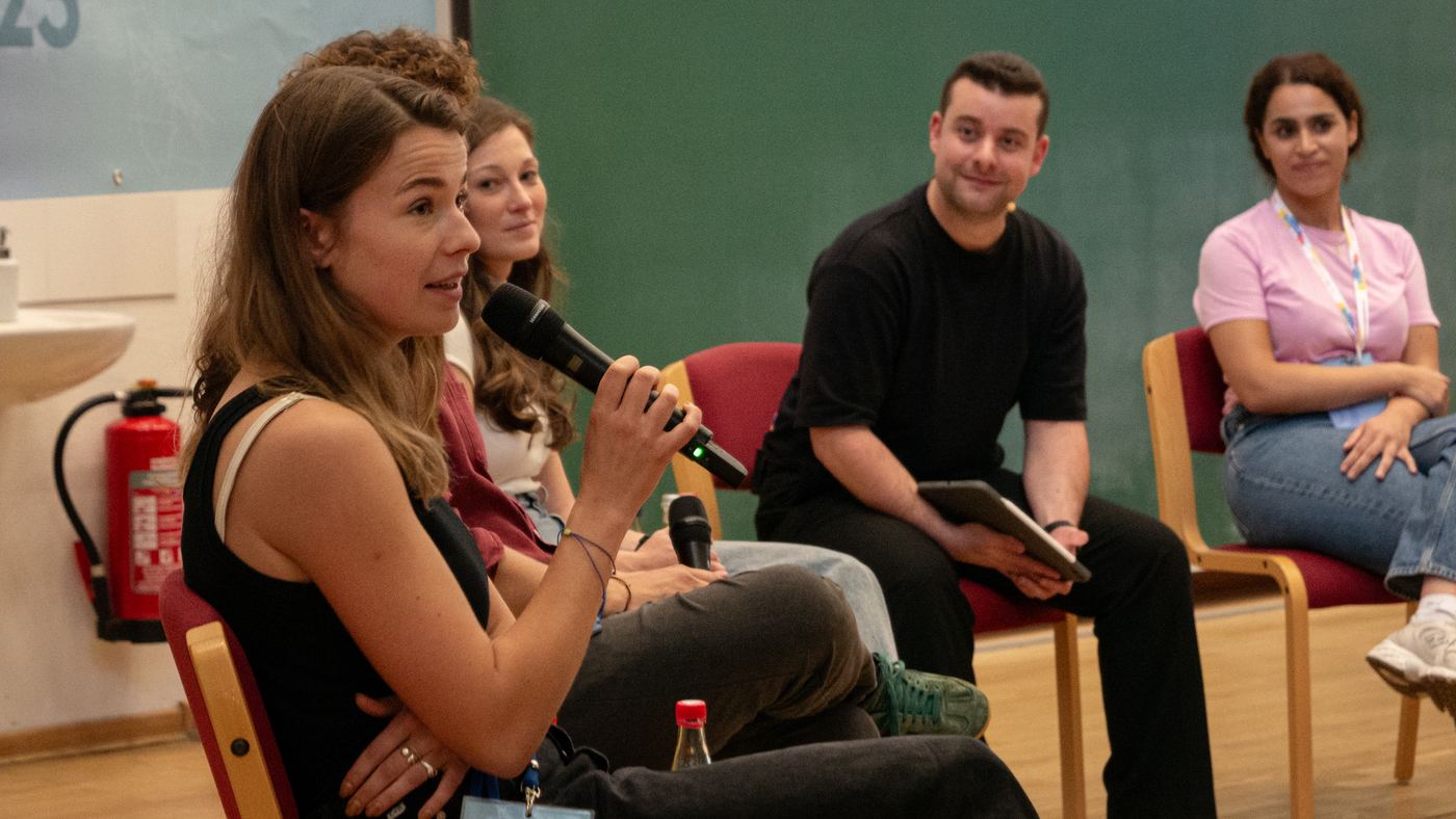 Podiumsgespräch beim Jungen Kongress für Geographie, Luca Samlidis moderiert